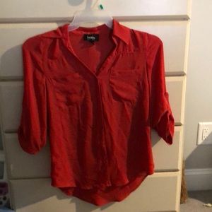 Reddish orange button up